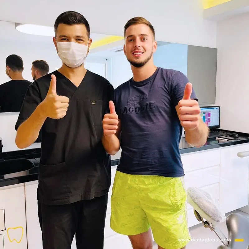 DENTAGLOBAL team member with a patient